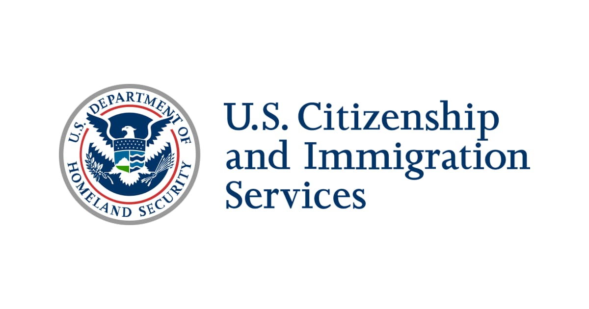 A USCIS office building, representing the agencies winding down Temporary Protected Status designations.